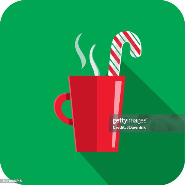 christmas flat design icon red mug with candy cane drink - christmas mug stock illustrations