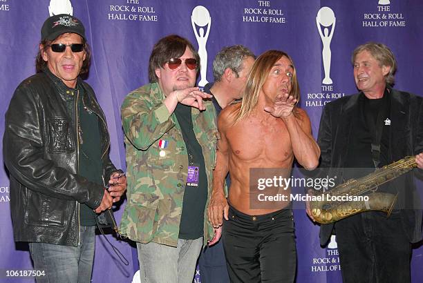 Scott Asheton, Ron Asheton, Mike Watt, Iggy Pop and Steve MacKay of The Stooges pose in the press room at the 2008 Rock and Roll Hall of Fame...