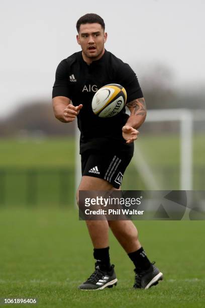 Codie Taylor of the All Blacks passes during a New Zealand All Black training session at the Ireland Sport Institute on November 15, 2018 in Dublin,...