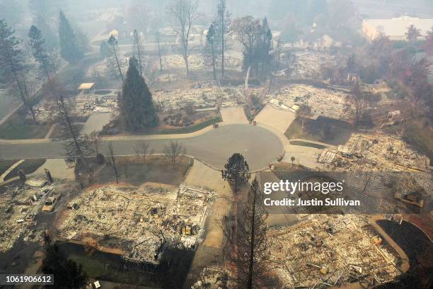 An aerial view of a neighborhood destroyed by the Camp Fire on November 15, 2018 in Paradise, California. Fueled by high winds and low humidity the...