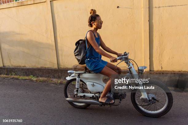 Woman riding motorbikes