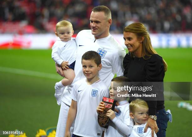 Wayne Rooney of England, his wife Coleen Rooney and their children Kit Joseph Ronney, Klay Anthony Rooney, Kai Wayne Rooney and Cass Mac Rooney pose...