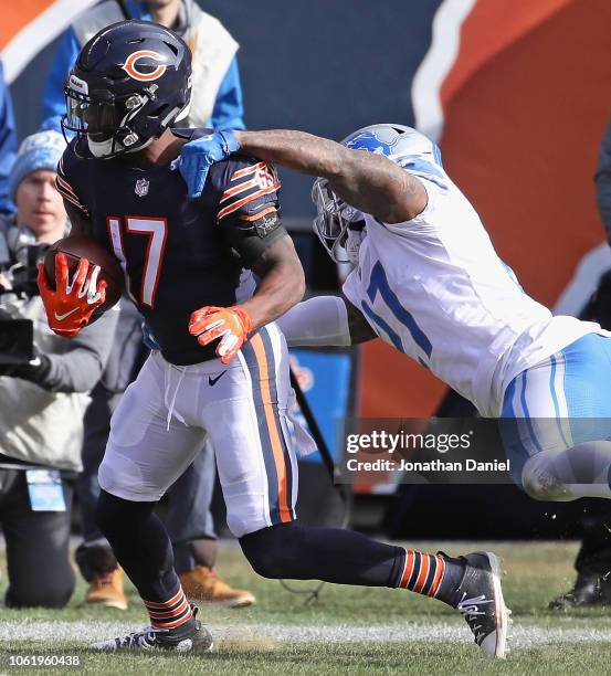 Anthony Miller of the Chicago Bears breaks away from Glover Quin of the Detroit Lions on his way to scoring a touchdwon at Soldier Field on November...