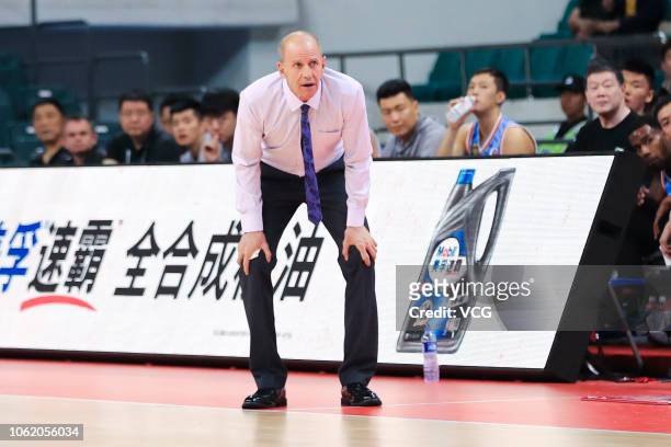 Xinjiang Guanghui Flying Tigers head coach Brian Goorjian shouts during the 2018/2019 Chinese Basketball Association League fifth round match between...