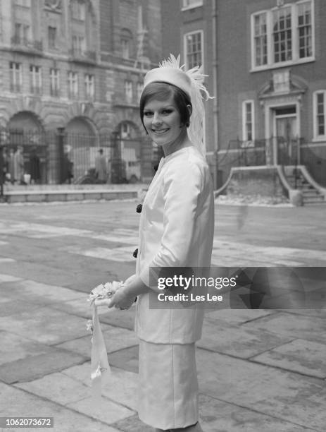 British fashion model Paulene Stone on her wedding day with Tony Norris, London, UK, 16th January 1963.