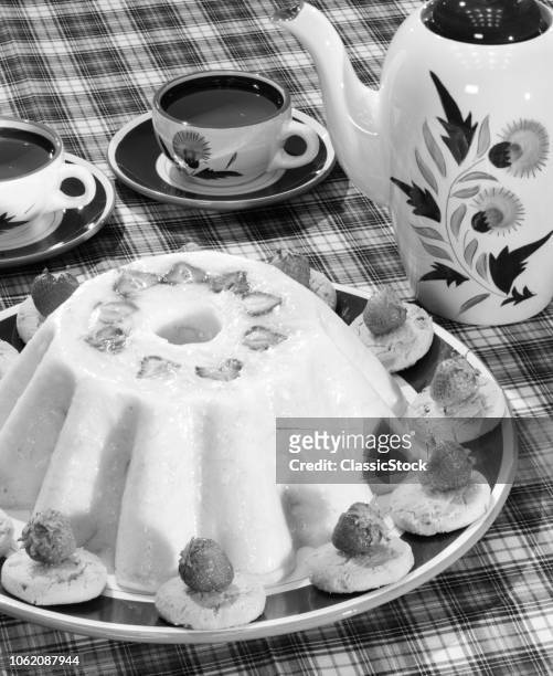 1950s PECAN SANDIES COOKIES AROUND JELLO MOLD WITH STRAWBERRIES DESSERT AND CUPS OF COFFEE