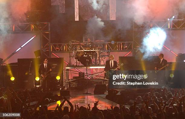 Ryan Peake, Chad Kroeger, Daniel Adair and Mike Kroeger of Nickelback