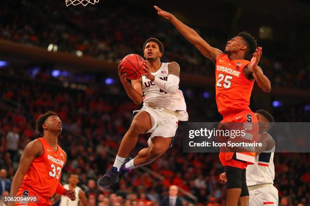 Connecticut Huskies guard Jalen Adams drives to the basket during the second half of the College Basketball game between the Syracuse Orange and the...