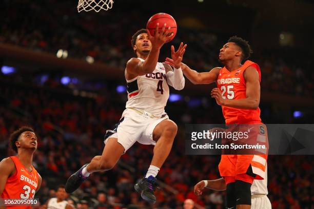 Connecticut Huskies guard Jalen Adams drives to the basket during the second half of the College Basketball game between the Syracuse Orange and the...