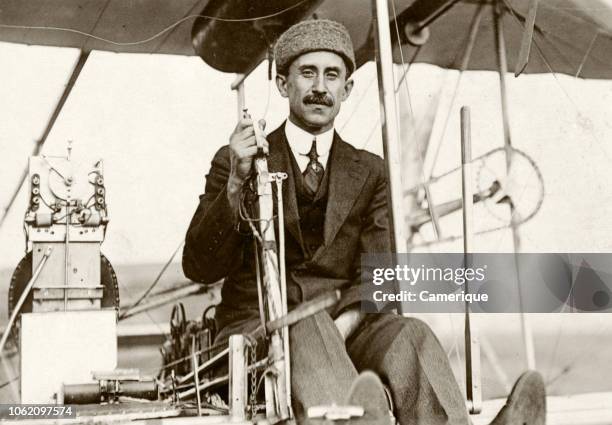 1900s ORVILLE WRIGHT LOOKING AT CAMERA PILOTING POWERED WRIGHT FLYER III CIRC 1905 HUFFMAN PRAIRIE DAYTON OHIO USA