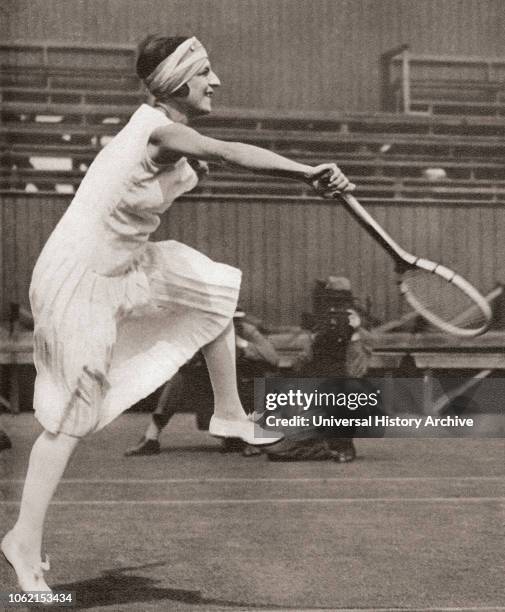 Suzanne Rachel Flore Lenglen, 1899 - 1938 French tennis player Seen here playing at Wimbledon in 1919 when she won the title From These Tremendous...