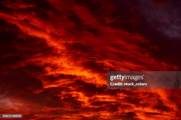 dramatic sky - fire red stock pictures, royalty-free photos & images