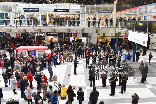 Military band plays at Liverpool Street Station in support of London Poppy Day on November 01, 2018 in London, England. Around 2,000 collectors...