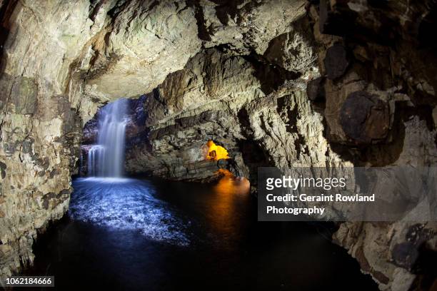 beautiful cave in scotland - catacomb stock pictures, royalty-free photos & images