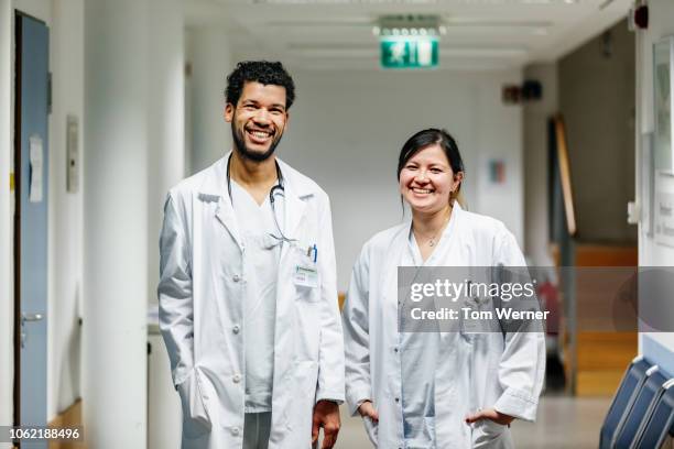 portrait of two medical students - young doctor stock pictures, royalty-free photos & images