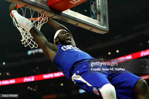 Montrezl Harrell of the Los Angeles Clippers reacts after dunking a ball during the first half of a game against the San Antonio Spurs at Staples...