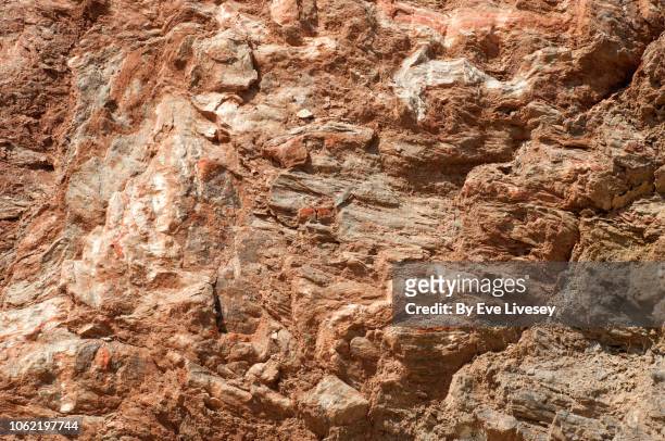 rock texture - red dirt background stock pictures, royalty-free photos & images