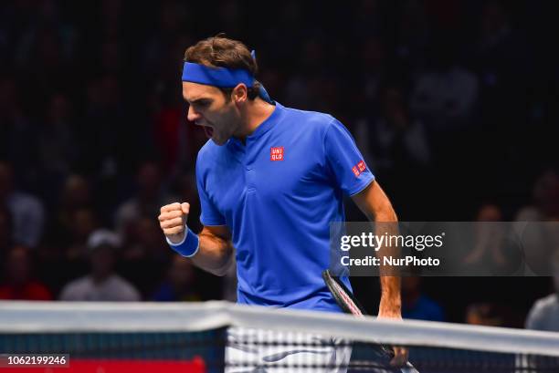 Roger Federer of Switzerland reacts during his round robin match against Kevin Anderson of South Africa during Day Five of the Nitto ATP Finals at...