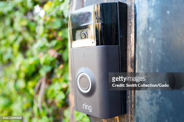Close-up of Ring doorbell, equipped with a camera and machine learning capabilities, installed outside a home in the Marina Del Rey neighborhood of...