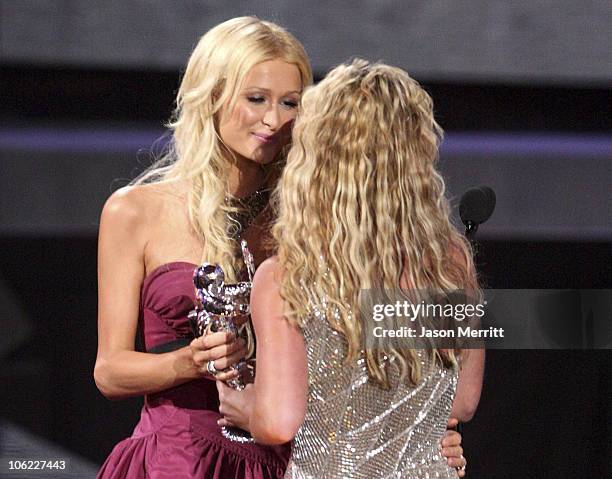 Personality Paris Hilton and Singer Britney Spears on stage at the 2008 MTV Video Music Awards at Paramount Pictures Studios on September 7, 2008 in...