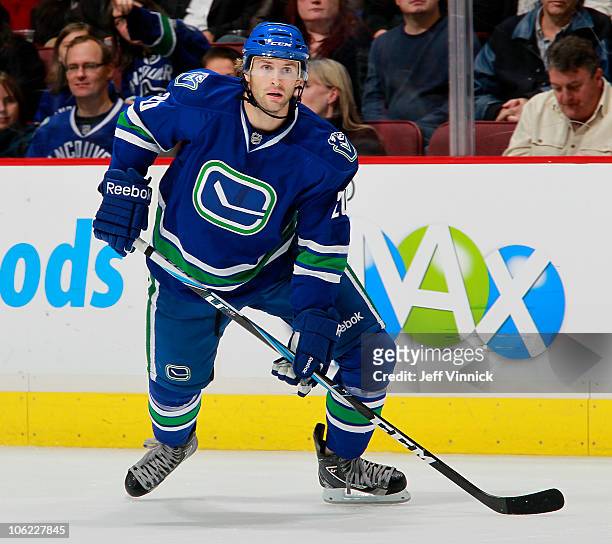Ryan Parent of the Vancouver Canucks skates up ice during a game against the Minnesota Wild at Rogers Arena on October 22, 2010 in Vancouver, British...