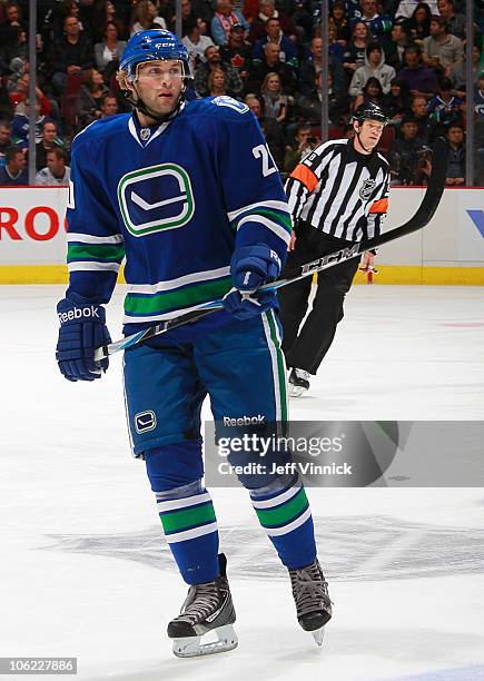 Ryan Parent of the Vancouver Canucks skates up ice during a game against the Minnesota Wild at Rogers Arena on October 22, 2010 in Vancouver, British...