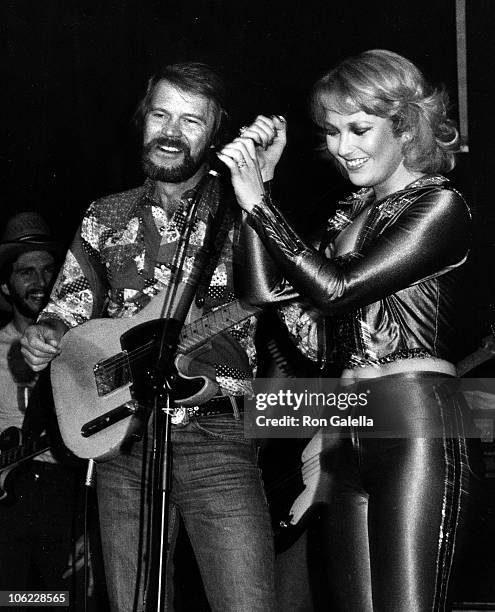 Glen Campbell and Tanya Tucker during Tanya Tucker Live in Concert - April 4, 1980 at Chuck Landis Country Club in Reseda, California, United States.