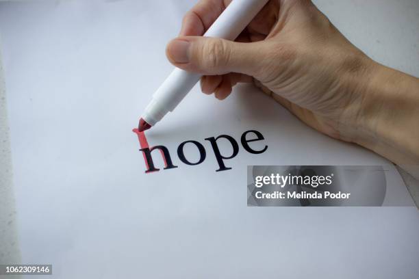 the word nope changed into hope with a red marker - hope word stock pictures, royalty-free photos & images