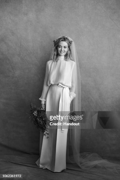 In this handout image provided by Inditex, Marta Ortega poses before her civil wedding with Carlos Torretta on November 16, 2018 in A Coruna, Spain....