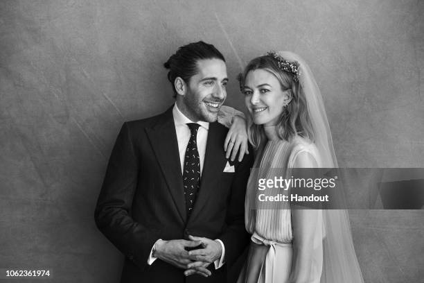 In this handout image provided by Inditex, Carlos Torretta and Marta Ortega pose before their civil wedding on November 16, 2018 in A Coruna, Spain....