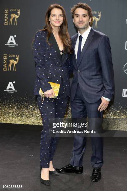 Yvonne Catterfeld, wearing Cartier jewelry, and Oliver Wnuk attends the 70th Bambi Awards at Stage Theater on November 16, 2018 in Berlin, Germany.