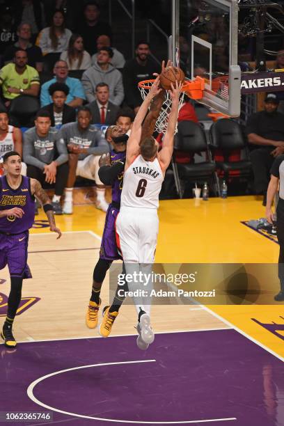 LeBron James of the Los Angeles Lakers blocks the shot of Nik Stauskas of the Portland Trail Blazers on November 14, 2018 at Staples Center in Los...