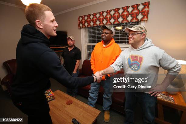 Donte DiVincenzo of the Milwaukee Bucks interacts with veterans while preparing dinner and playing board games on November 11, 2018 at the Zablocki...