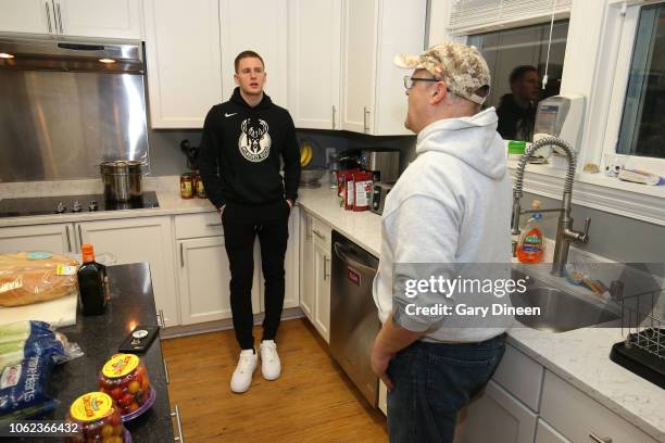 Donte DiVincenzo of the Milwaukee Bucks interacts with veterans while preparing dinner and playing board games on November 11, 2018 at the Zablocki...