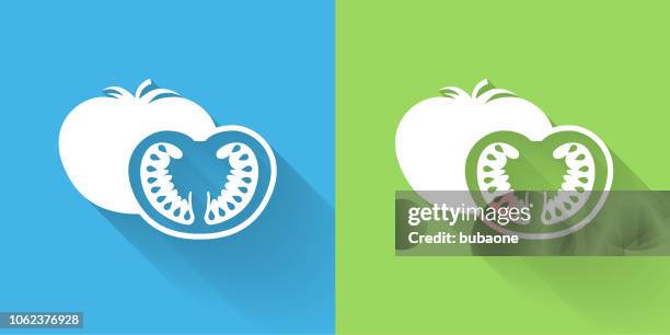 sliced tomato icon with long shadow - halved tomatoes stock illustrations