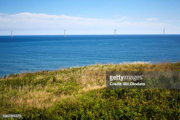 wint turbines on the water - block island stock-fotos und bilder
