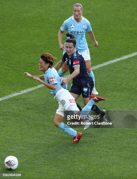 Lisa De Vanna of Sydney FC fouls Yukari Kinga of the Melbourne City during the round two W-League match between Melbourne City and Sydney FC at AAMI...