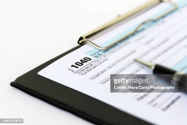 tax time - 1040 tax form stock pictures, royalty-free photos & images