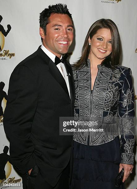 Oscar De La Hoya and wife Millie Corretjer during The 2006 Oscar De La Hoya Foundation "Evening of Champions" - Arrivals at Beverly Hilton Hotel in...