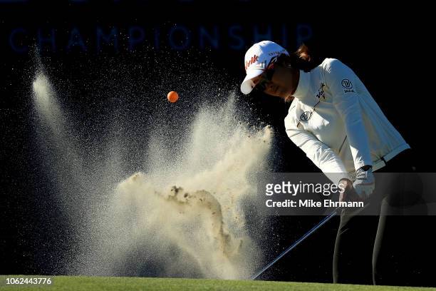 Chella Choi of Korea plays a shot from a bunker on the 18th hole during the second round of the CME Group Tour Championship at Tiburon Golf Club on...