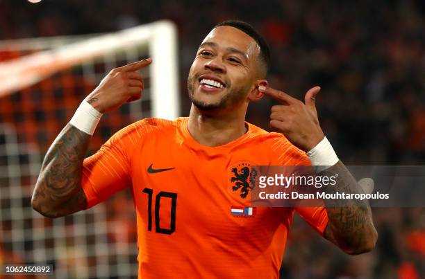 Memphis Depay of the Netherlands celebrates after scoring his team's second goal during the UEFA Nations League Group A match between Netherlands and...