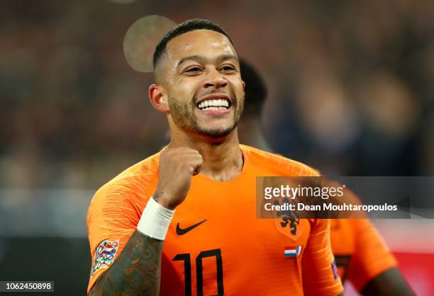 Memphis Depay of the Netherlands celebrates after scoring his team's second goal during the UEFA Nations League Group A match between Netherlands and...