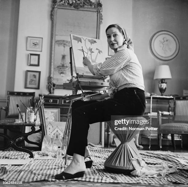Irish actress Valerie Hobson, Baroness Profumo , painting at her house, UK, 5th February 1963.