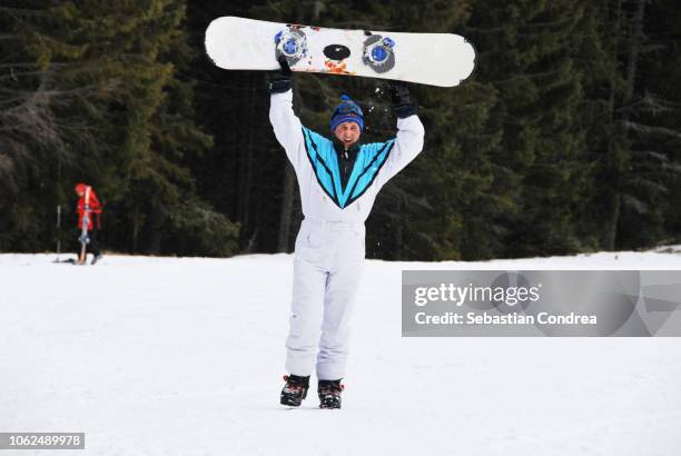 young snowboarder who learns to play with, baisoara, buscat, romania - sweden snowboarding stock pictures, royalty-free photos & images