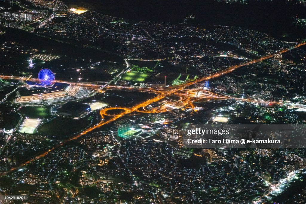 The Expo’70 Commemorative Park in Suita city, Meishin Expressway and Chugoku Expressway night time aerial view from airplane