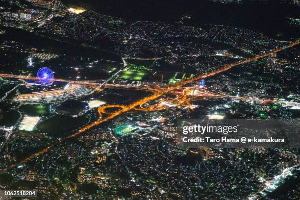 the expo’70 commemorative park in suita city, meishin expressway and chugoku expressway night time aerial view from airplane - osaka world's fair stock pictures, royalty-free photos & images