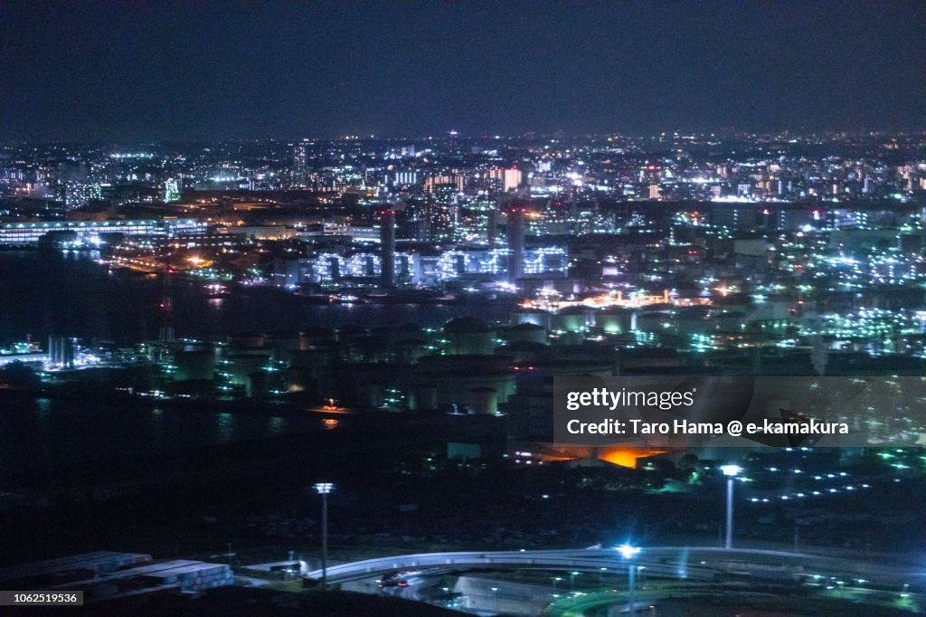 Factory area in Kawasaki city in Kanagawa prefecture in Japan night time aerial view from airplane