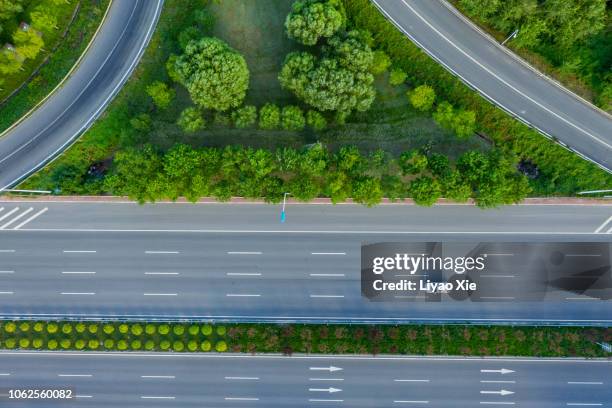 road junction aerial view - interstate stock pictures, royalty-free photos & images