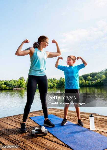 mother and son fitness - mom exercising stock pictures, royalty-free photos & images