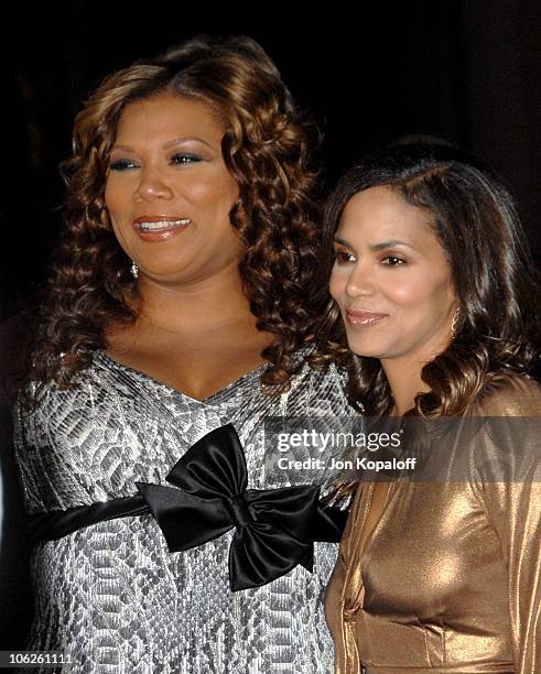 Queen Latifah and Halle Berry during 33rd Annual People's Choice Awards - Arrivals at Shrine Auditorium in Los Angeles, California, United States.